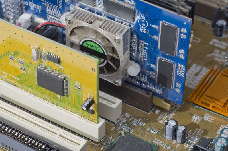 11172765 - computer motherboard with pluged components. vga and pci card.